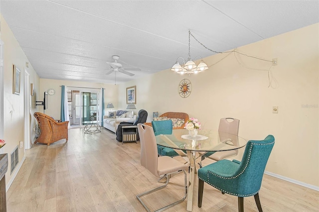 708 Tamiami Trl S Unit 115, Venice, FL 34285 - dining space featuring light wood-type flooring and a ceiling fan