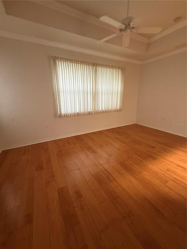3790 Cadbury Cir Unit 40, Venice, FL 34293 - unfurnished room featuring wood-type flooring, crown molding, and a ceiling fan