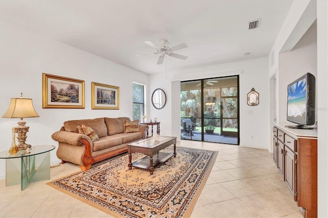11103 Batello Dr, Venice, FL 34292 - living room featuring light tile patterned floors and a ceiling fan