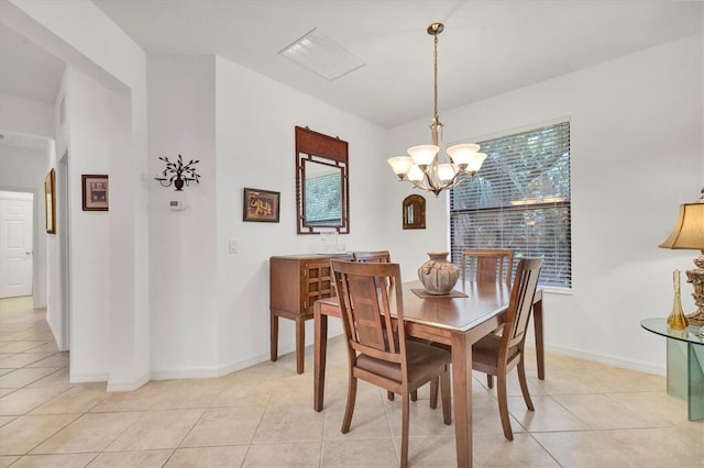 11103 Batello Dr, Venice, FL 34292 - dining area featuring light tile patterned floors, a chandelier, and plenty of natural light