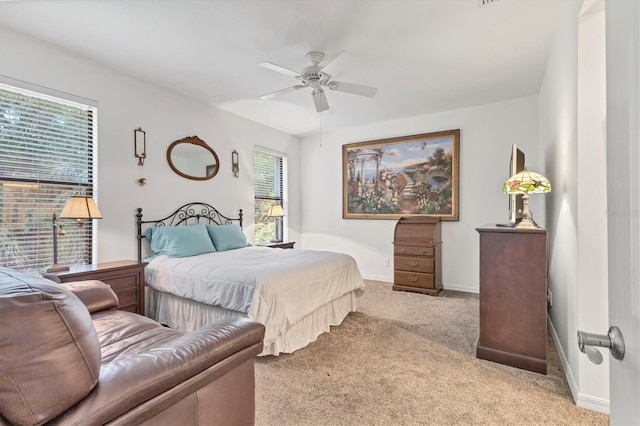 11103 Batello Dr, Venice, FL 34292 - carpeted bedroom with baseboards and ceiling fan