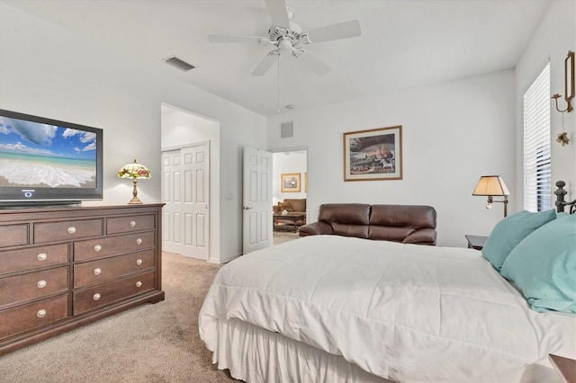 11103 Batello Dr, Venice, FL 34292 - bedroom featuring light colored carpet, a closet, and ceiling fan