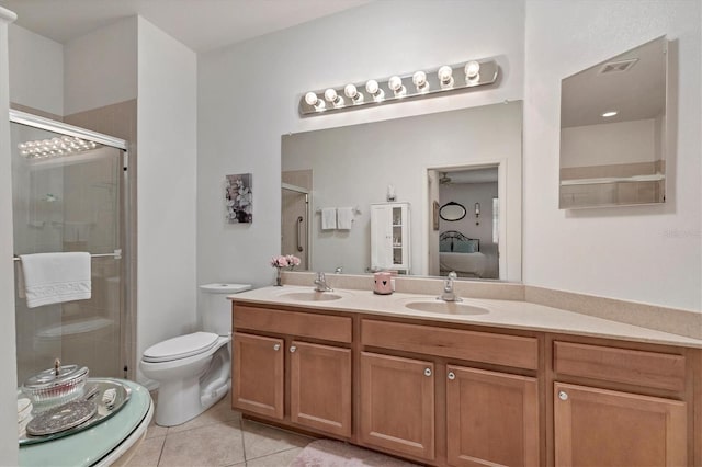11103 Batello Dr, Venice, FL 34292 - full bath featuring ensuite bath, tile patterned floors, a stall shower, and double vanity