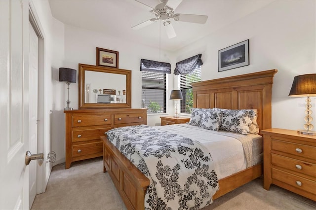 11103 Batello Dr, Venice, FL 34292 - bedroom featuring light colored carpet and ceiling fan