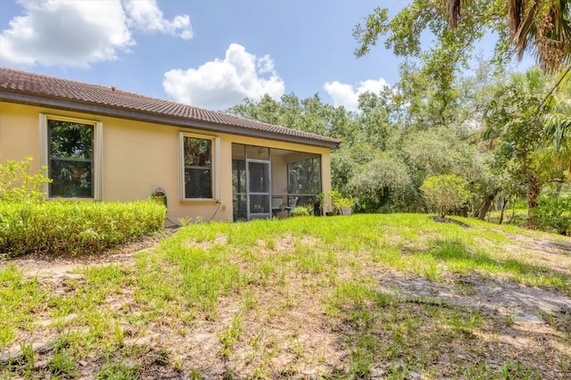 11103 Batello Dr, Venice, FL 34292 - view of yard featuring a sunroom