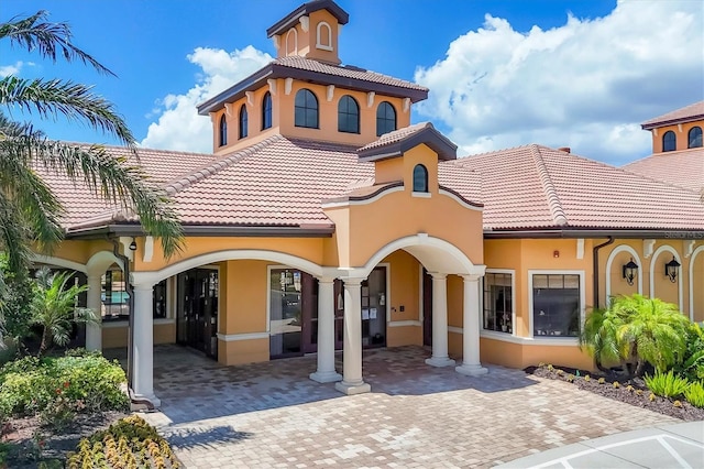 11103 Batello Dr, Venice, FL 34292 - back of property with stucco siding and a tiled roof