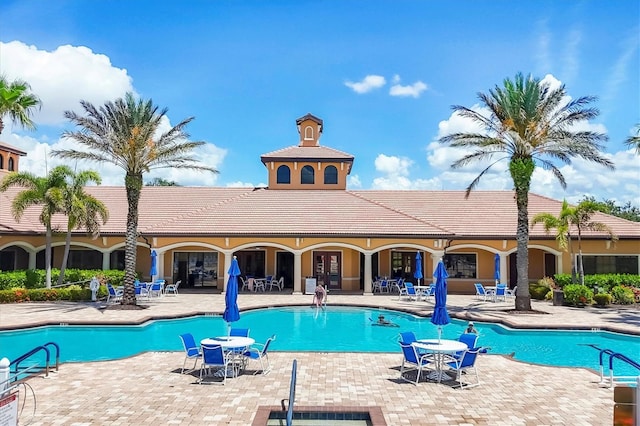 11103 Batello Dr, Venice, FL 34292 - community pool featuring a patio