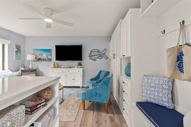 1555 Tarpon Center Dr Unit G 235, Venice, FL 34285 - sitting room with light wood finished floors and a ceiling fan
