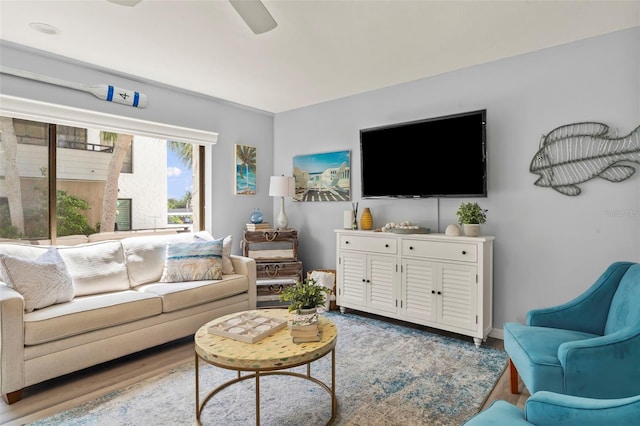 1555 Tarpon Center Dr Unit G 235, Venice, FL 34285 - living area with wood finished floors and a ceiling fan