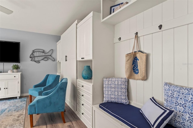 1555 Tarpon Center Dr Unit G 235, Venice, FL 34285 - mudroom featuring wood finished floors and baseboards