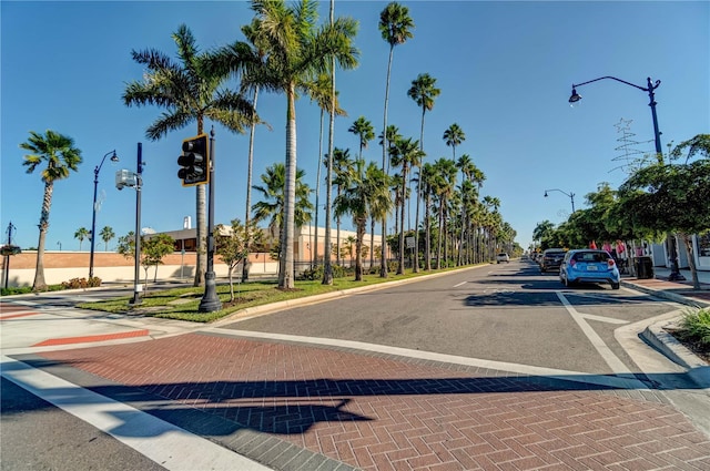 1555 Tarpon Center Dr Unit G 235, Venice, FL 34285 - view of asphalt street with street lights, sidewalks, and curbs