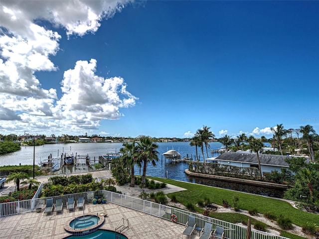 516 Tamiami Trl S Unit 303, Nokomis, FL 34275 - water view featuring a dock and boat lift