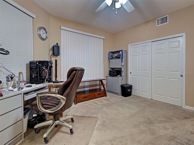 516 Tamiami Trl S Unit 303, Nokomis, FL 34275 - office area with ceiling fan, carpet floors, and a textured ceiling