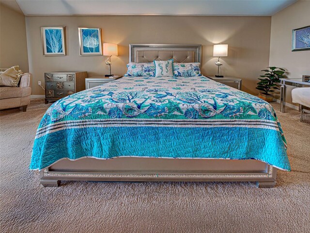 516 Tamiami Trl S Unit 303, Nokomis, FL 34275 - carpeted bedroom featuring baseboards