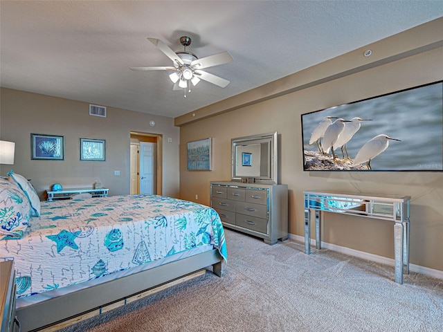 516 Tamiami Trl S Unit 303, Nokomis, FL 34275 - carpeted bedroom with ceiling fan and baseboards