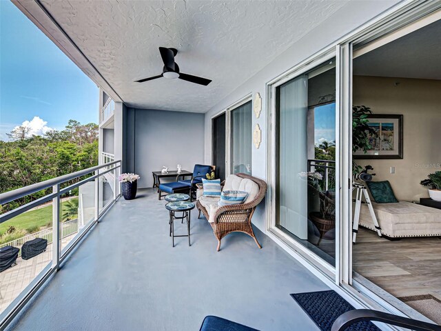516 Tamiami Trl S Unit 303, Nokomis, FL 34275 - balcony with a ceiling fan