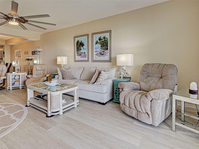 516 Tamiami Trl S Unit 303, Nokomis, FL 34275 - living area featuring wood finished floors and a ceiling fan