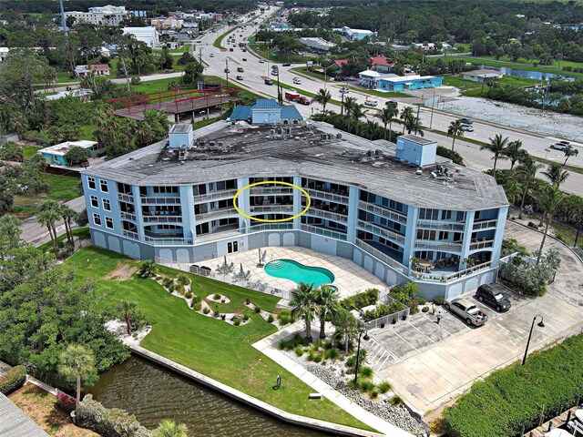 516 Tamiami Trl S Unit 303, Nokomis, FL 34275 - bird's eye view of a pool and a large body of water