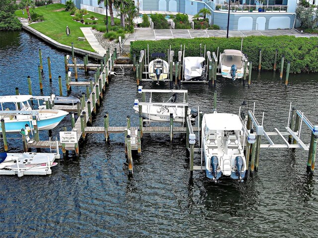 516 Tamiami Trl S Unit 303, Nokomis, FL 34275 - dock with boat lift and a water view