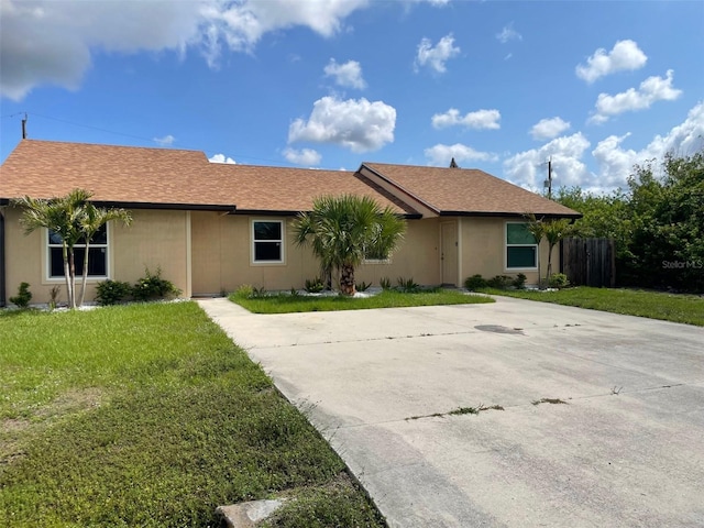 11248 Pendleton Ave Unit A & B, Englewood, FL 34224 - ranch-style house with driveway and roof with shingles