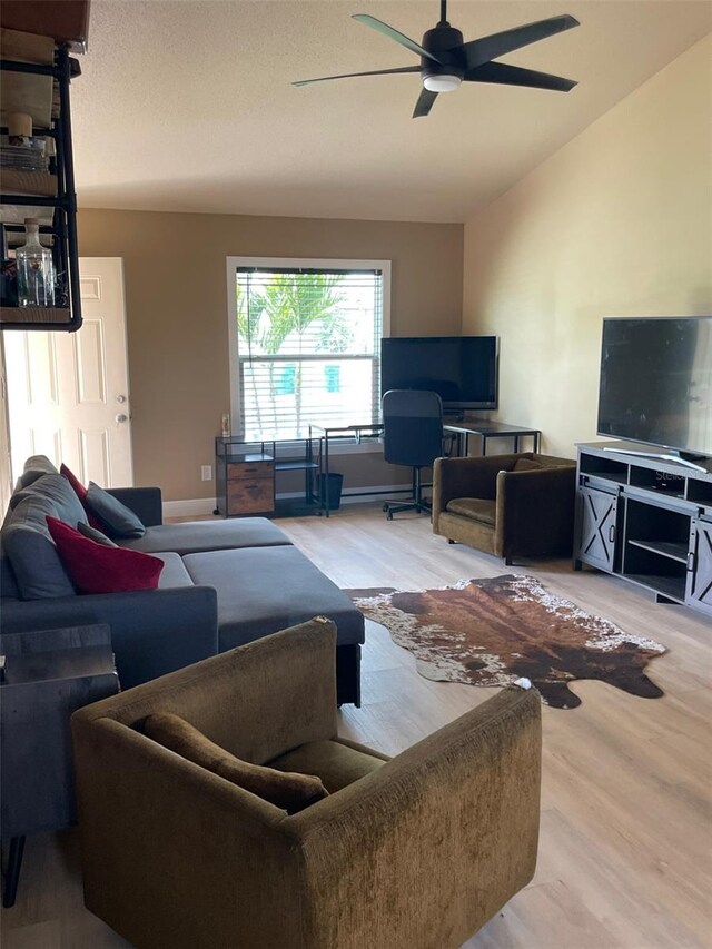 11248 Pendleton Ave Unit A & B, Englewood, FL 34224 - living area with ceiling fan, wood finished floors, and lofted ceiling