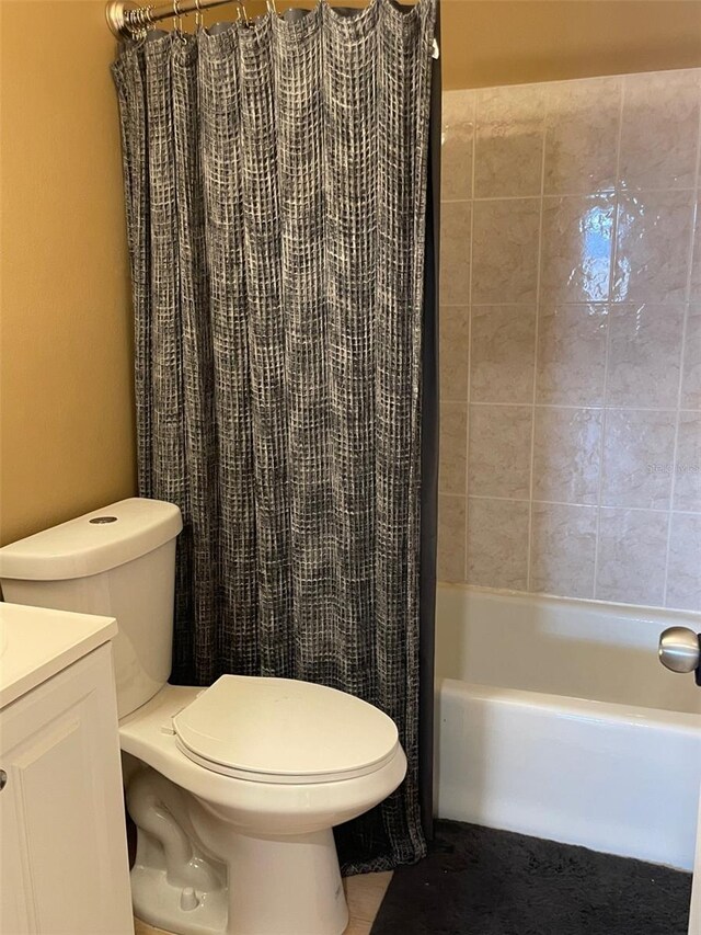11248 Pendleton Ave Unit A & B, Englewood, FL 34224 - full bath with toilet, vanity, and shower / bath combination with curtain