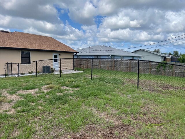 11248 Pendleton Ave Unit A & B, Englewood, FL 34224 - view of yard featuring central AC