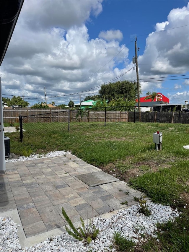 11248 Pendleton Ave Unit A & B, Englewood, FL 34224 - view of yard featuring a patio