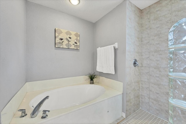 188 Grand Oak Cir, Venice, FL 34292 - full bath with a garden tub and a tile shower