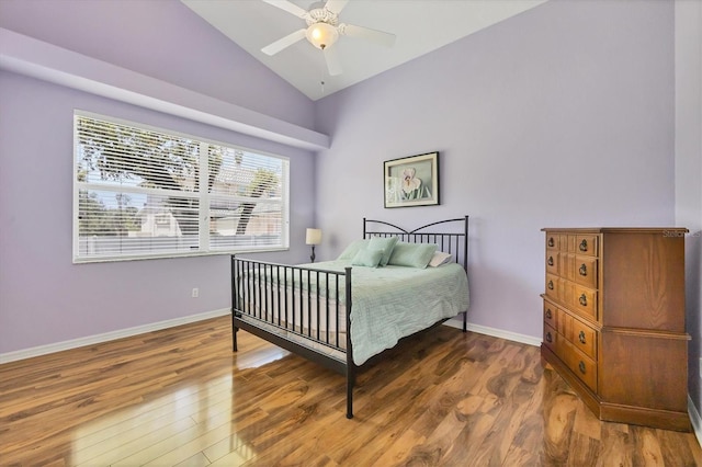 188 Grand Oak Cir, Venice, FL 34292 - bedroom with vaulted ceiling, wood finished floors, and ceiling fan