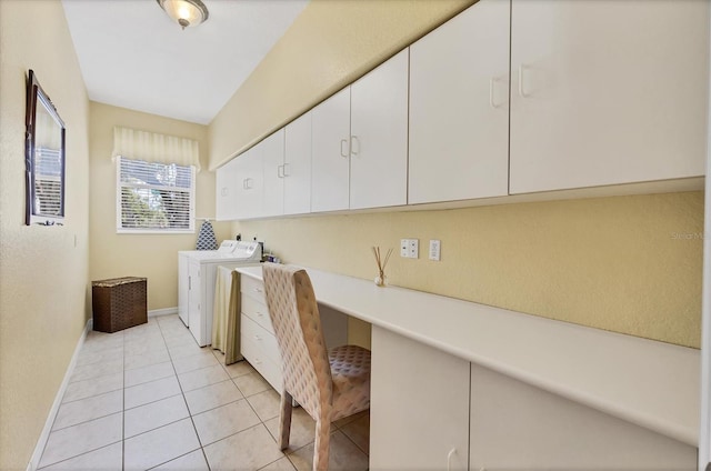 188 Grand Oak Cir, Venice, FL 34292 - laundry room with cabinet space, separate washer and dryer, light tile patterned floors, and a desk