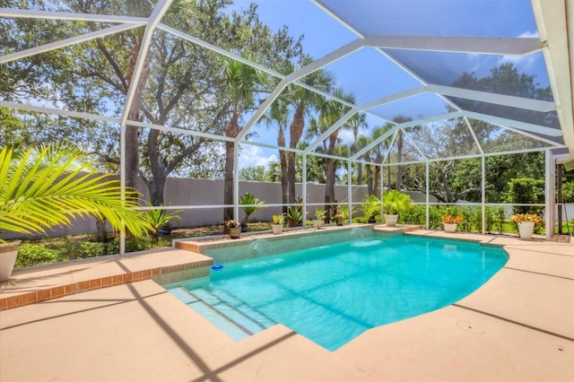 188 Grand Oak Cir, Venice, FL 34292 - view of swimming pool with a patio, a fenced backyard, and glass enclosure