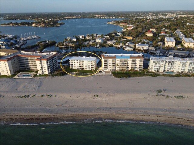 1100 Tarpon Center Dr Unit 503-5C, Venice, FL 34285 - drone / aerial view of expansive beach and apartment complex / building