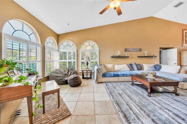 249 Hallcrest Ter, Port Charlotte, FL 33954 - living area featuring ceiling fan, high vaulted ceiling, plenty of natural light, and light tile patterned flooring