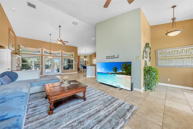 249 Hallcrest Ter, Port Charlotte, FL 33954 - tiled living area featuring ceiling fan, high vaulted ceiling, and baseboards