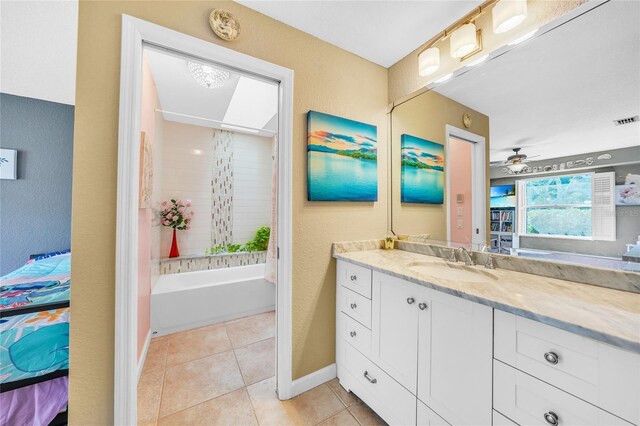 249 Hallcrest Ter, Port Charlotte, FL 33954 - bathroom featuring vanity, tile patterned flooring, baseboards, shower / washtub combination, and connected bathroom