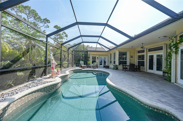249 Hallcrest Ter, Port Charlotte, FL 33954 - swimming pool featuring french doors, a patio area, a ceiling fan, and glass enclosure