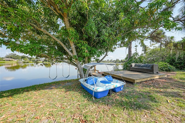 249 Hallcrest Ter, Port Charlotte, FL 33954 - view of green lawn with a deck with water view