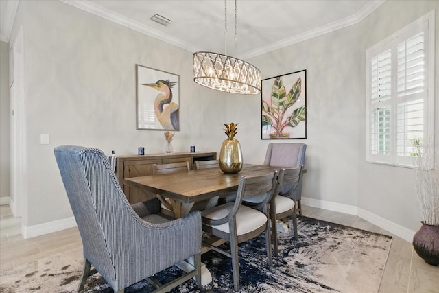 15336 Spanish Point Dr, Port Charlotte, FL 33981 - dining room with a chandelier and ornamental molding