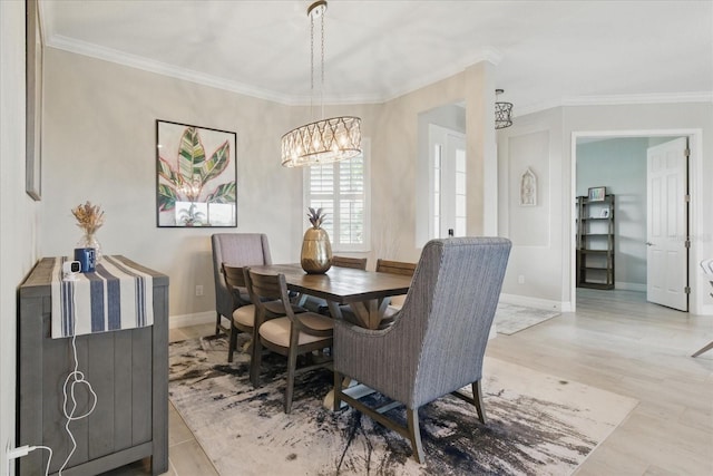 15336 Spanish Point Dr, Port Charlotte, FL 33981 - dining space with a chandelier, crown molding, and wood finished floors