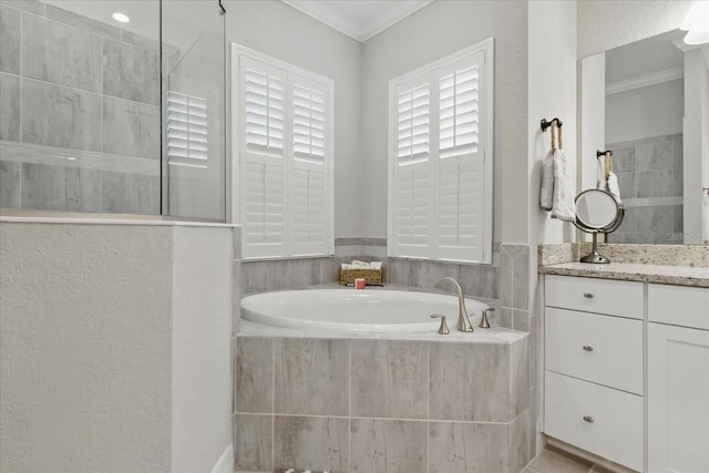 15336 Spanish Point Dr, Port Charlotte, FL 33981 - bathroom featuring a bath, vanity, crown molding, a walk in shower, and a textured wall