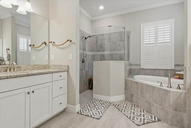 15336 Spanish Point Dr, Port Charlotte, FL 33981 - bathroom featuring a walk in shower, ornamental molding, vanity, and a garden tub