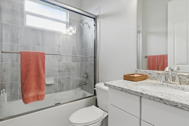 15336 Spanish Point Dr, Port Charlotte, FL 33981 - bathroom featuring vanity, enclosed tub / shower combo, and a textured wall