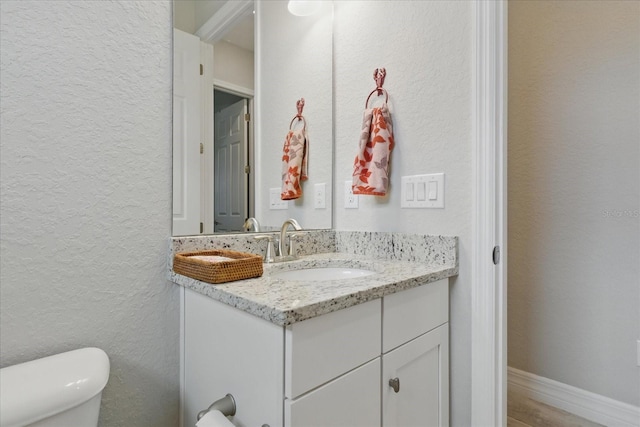 15336 Spanish Point Dr, Port Charlotte, FL 33981 - bathroom with a textured wall and vanity