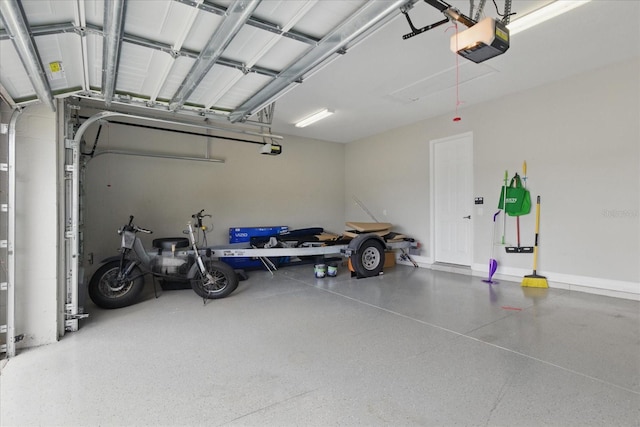 15336 Spanish Point Dr, Port Charlotte, FL 33981 - garage with a garage door opener
