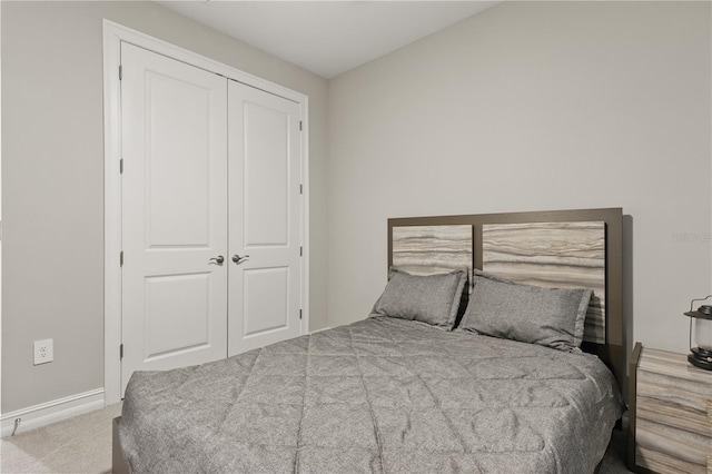 15963 Crofton Springs Way, Port Charlotte, FL 33953 - bedroom with carpet floors, a closet, and baseboards