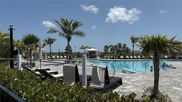 15963 Crofton Springs Way, Port Charlotte, FL 33953 - community pool with a patio area