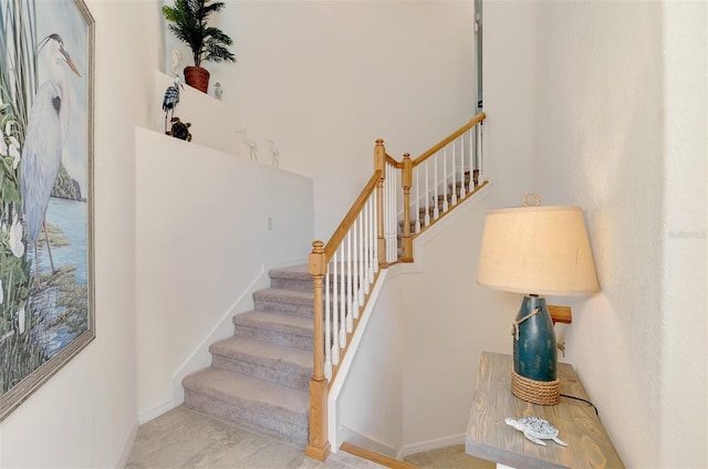 10789 Tarflower Dr Unit 202, Venice, FL 34293 - stairs featuring baseboards