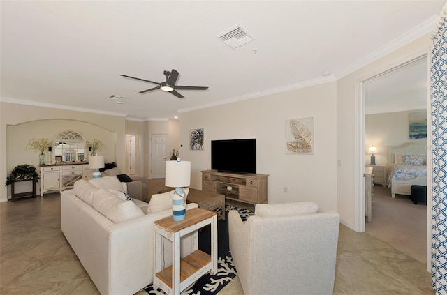 10789 Tarflower Dr Unit 202, Venice, FL 34293 - living room featuring a ceiling fan and crown molding