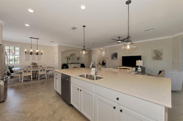 10789 Tarflower Dr Unit 202, Venice, FL 34293 - kitchen with ornamental molding, appliances with stainless steel finishes, open floor plan, a ceiling fan, and white cabinetry